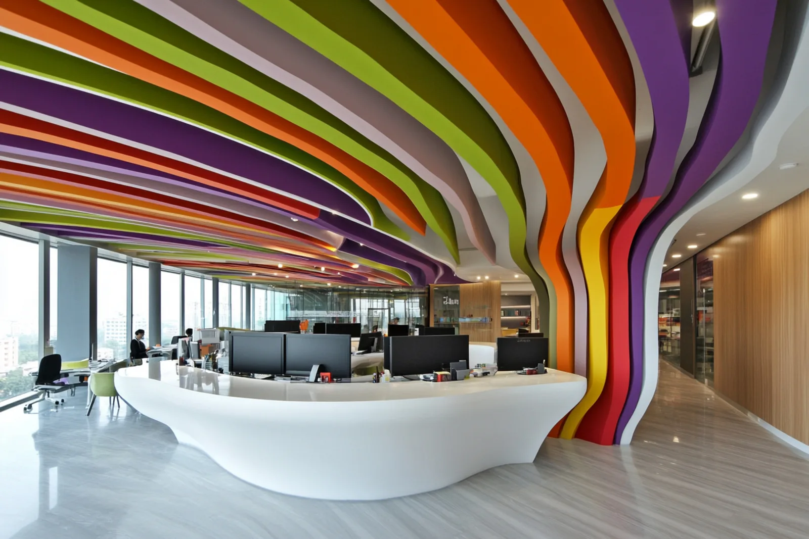 Office interior with a bold colorful ceiling installation