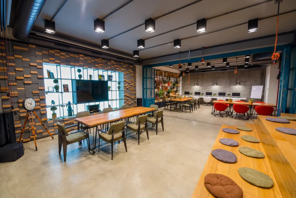 Open plan office with zoned areas and tiered seating